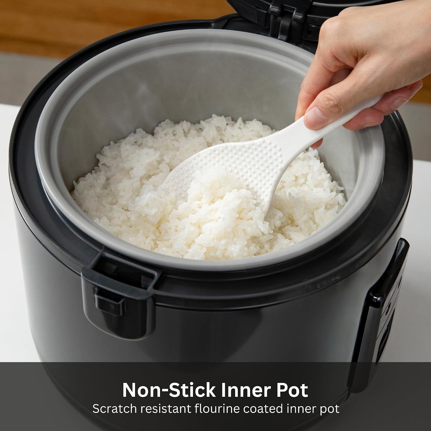 Tiger JNP-S10U-KY 5.5 Cup Capacity Rice Cooker with Non-Stick Inner Pot, Retractable Power Cord, and Keep Warm up to 12 hours, Black - Image 4