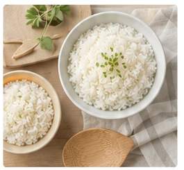 Bowls of cooked white rice in a soft neutral setting